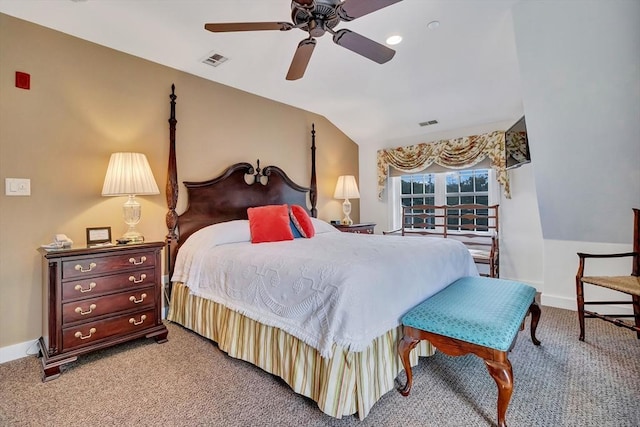 bedroom featuring light carpet, baseboards, visible vents, and lofted ceiling