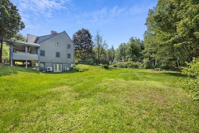 1292 Main St, Lancaster, MA 01523 - view of green lawn featuring french doors