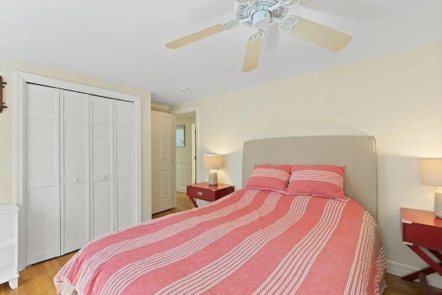 4 Wildwood Ave, Harwich, MA 02645 - bedroom with wood finished floors, a ceiling fan, and a closet