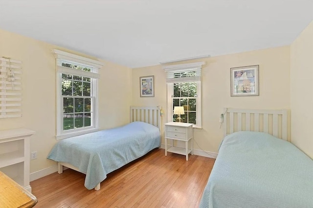 4 Wildwood Ave, Harwich, MA 02645 - bedroom featuring light wood-style floors and multiple windows