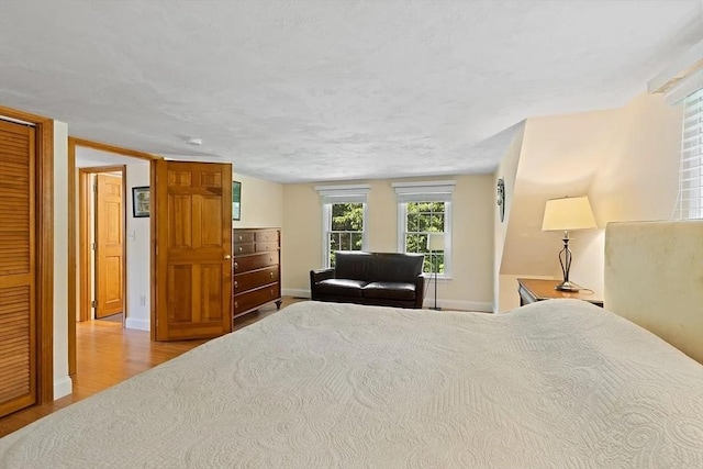 4 Wildwood Ave, Harwich, MA 02645 - bedroom featuring wood finished floors and baseboards