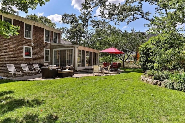 4 Wildwood Ave, Harwich, MA 02645 - view of grassy yard featuring a patio, outdoor lounge area, and a sunroom