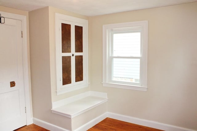 49 Newcomb Rd, Stoneham, MA 02180 - mudroom featuring baseboards and wood finished floors
