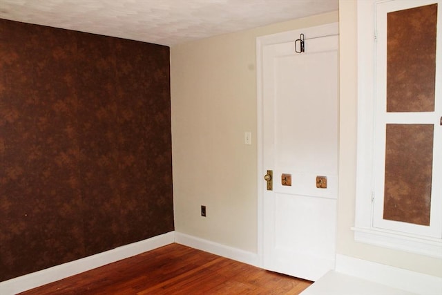 49 Newcomb Rd, Stoneham, MA 02180 - spare room featuring wood finished floors and baseboards