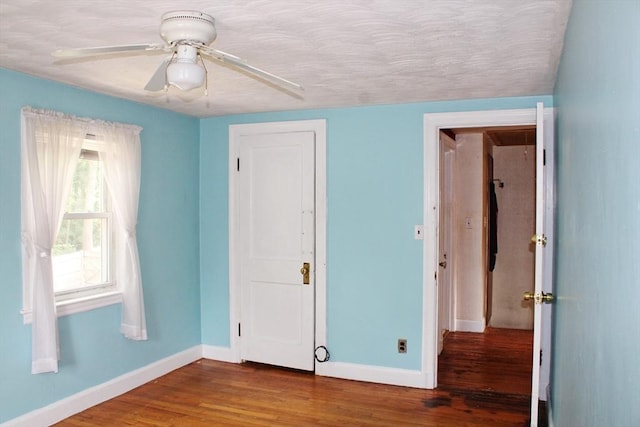 49 Newcomb Rd, Stoneham, MA 02180 - unfurnished bedroom featuring wood finished floors, ceiling fan, and a closet