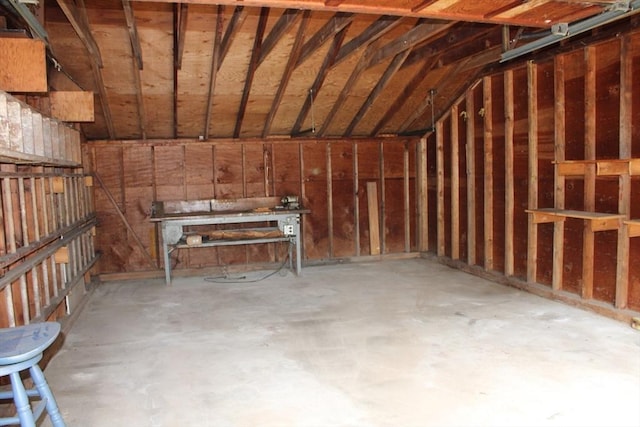 49 Newcomb Rd, Stoneham, MA 02180 - miscellaneous room featuring vaulted ceiling and concrete floors