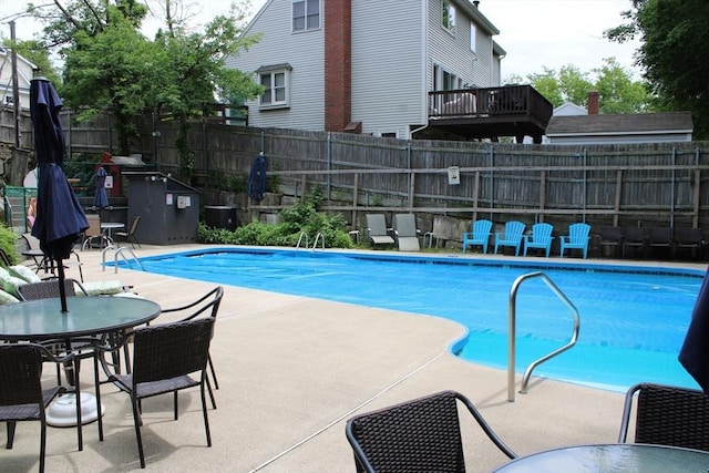49 Newcomb Rd, Stoneham, MA 02180 - community pool with a fenced backyard and a patio