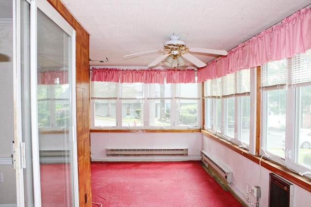 49 Newcomb Rd, Stoneham, MA 02180 - unfurnished sunroom with baseboard heating, carpet floors, a baseboard heating unit, and a textured ceiling