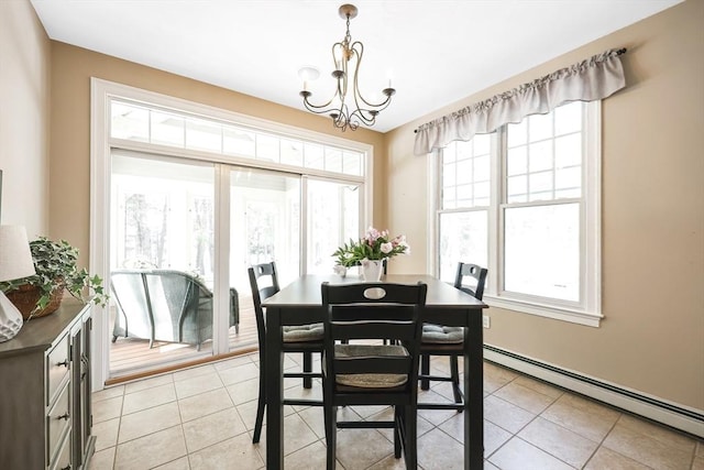 dining space with a baseboard radiator, light tile patterned floors, and a notable chandelier