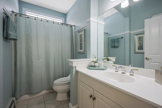 bathroom with a baseboard radiator, toilet, tile patterned floors, and vanity