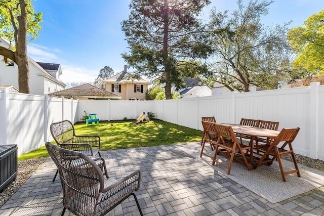 view of patio featuring outdoor dining area