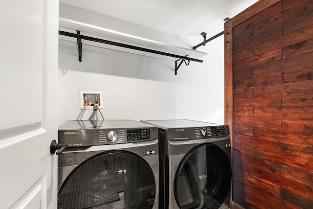 washroom with washer and clothes dryer