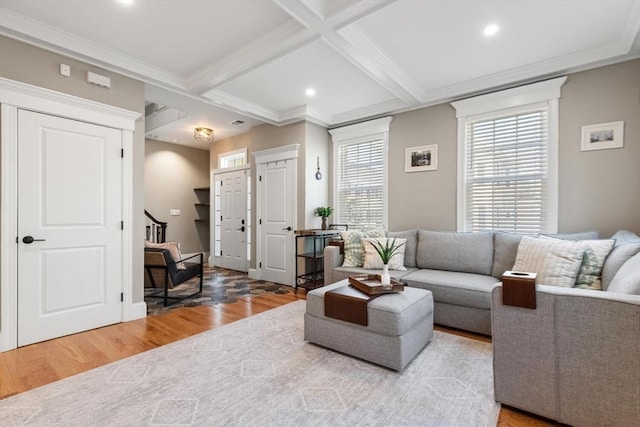 living area with wood finished floors, stairway, beamed ceiling, and recessed lighting