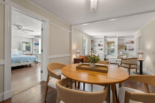 23 Hanson St, Wakefield, MA 01880 - dining room featuring wood finished floors, ceiling fan, and built in shelves