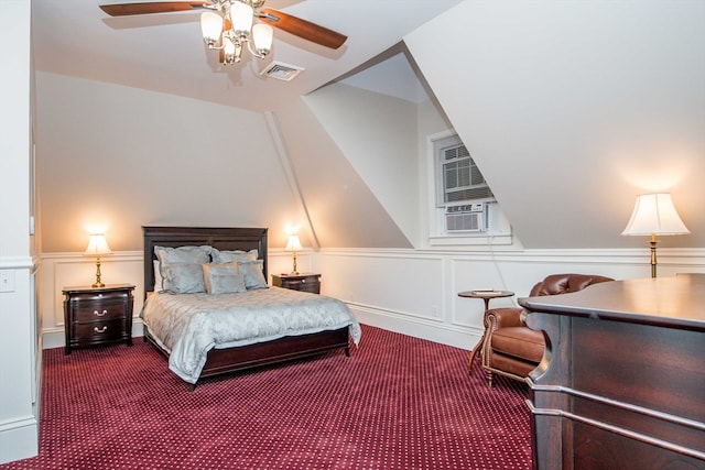 carpeted bedroom featuring lofted ceiling, ceiling fan, and cooling unit