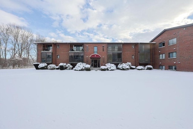 view of snow covered property