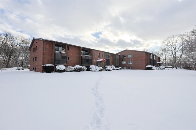 view of snow covered property