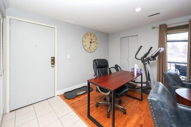 office with light tile patterned flooring