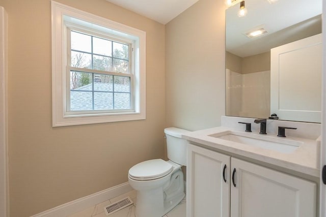full bathroom featuring vanity, toilet, baseboards, a shower, and visible vents