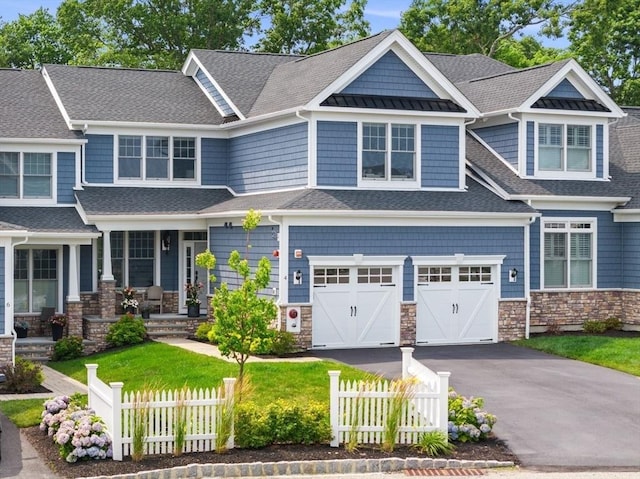 craftsman-style home with a garage