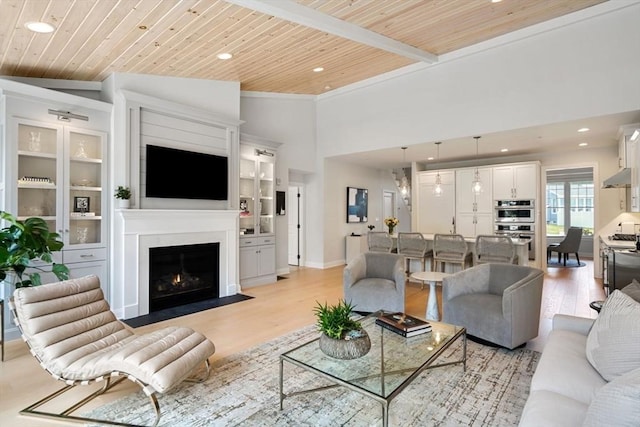 living room featuring built in features, wood ceiling, light hardwood / wood-style flooring, and high vaulted ceiling