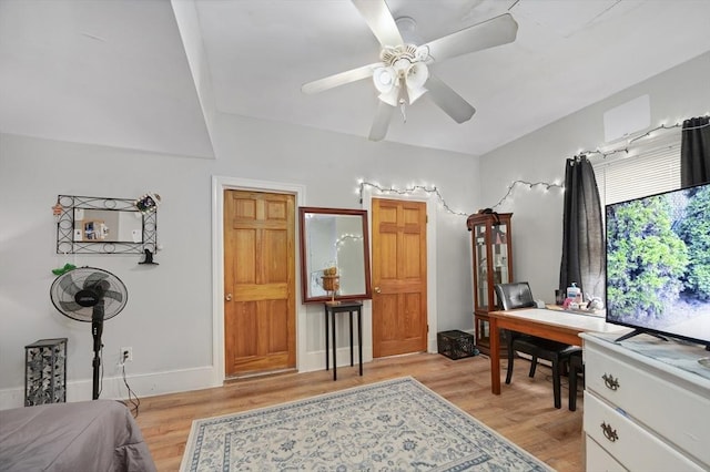 186 Summit St, Pawtucket, RI 02860 - bedroom with light wood finished floors, an office area, a ceiling fan, and baseboards