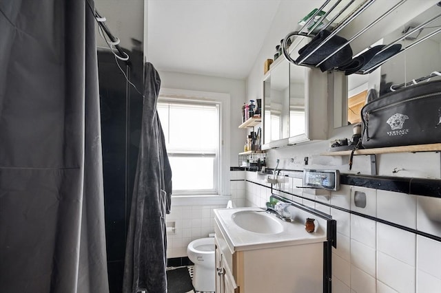 186 Summit St, Pawtucket, RI 02860 - bathroom featuring tile walls, vanity, and toilet
