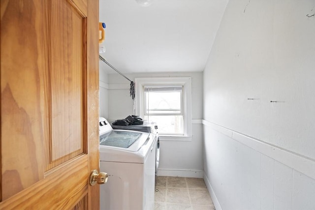 186 Summit St, Pawtucket, RI 02860 - washroom with washer and dryer, baseboards, and light tile patterned flooring