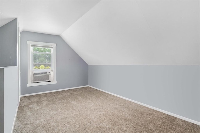 12 Cross St, Pepperell, MA 01463 - bonus room with carpet, lofted ceiling, baseboards, and cooling unit