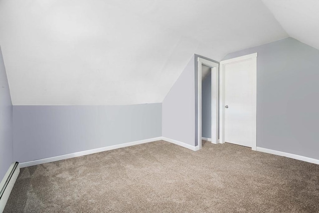 12 Cross St, Pepperell, MA 01463 - bonus room with a baseboard heating unit, lofted ceiling, carpet, and baseboards