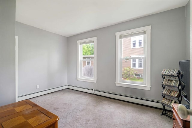 12 Cross St, Pepperell, MA 01463 - carpeted spare room featuring baseboard heating