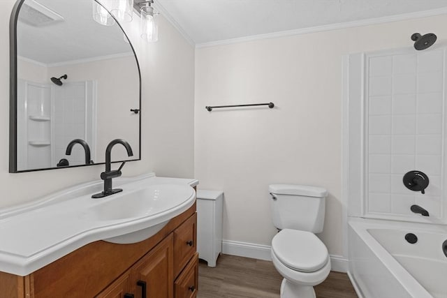29 Adams Ct Unit 29, Amesbury, MA 01913 - bathroom featuring wood finished floors, toilet, ornamental molding, vanity, and baseboards