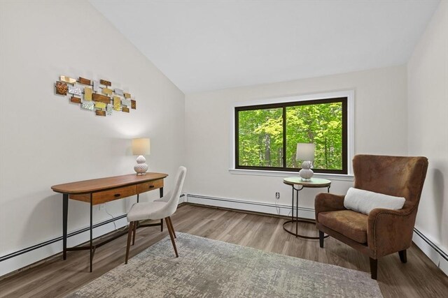 29 Adams Ct Unit 29, Amesbury, MA 01913 - home office featuring baseboard heating, lofted ceiling, and wood finished floors