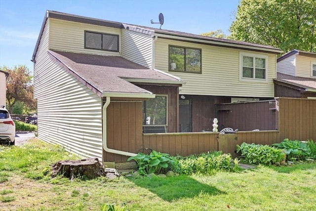 29 Adams Ct Unit 29, Amesbury, MA 01913 - view of front of home with fence and roof with shingles