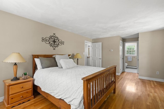 1005 Forest St, North Andover, MA 01845 - bedroom with a baseboard radiator, baseboards, light wood-style flooring, and ensuite bath