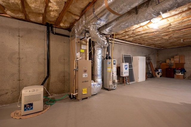 75 Orchard Meadow Dr Unit 75, Shrewsbury, MA 01545 - unfinished below grade area with heating unit and water heater