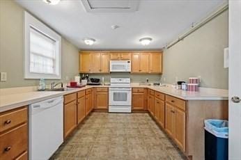 75 Orchard Meadow Dr Unit 75, Shrewsbury, MA 01545 - kitchen with white appliances, light countertops, and a sink