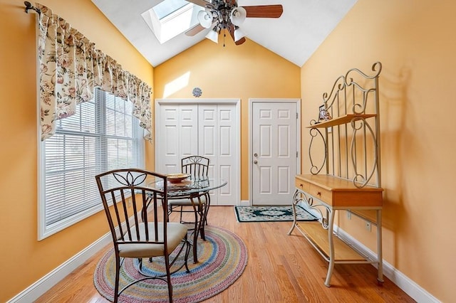 75 Orchard Meadow Dr Unit 75, Shrewsbury, MA 01545 - foyer entrance with lofted ceiling with skylight, a ceiling fan, light wood-style floors, and baseboards