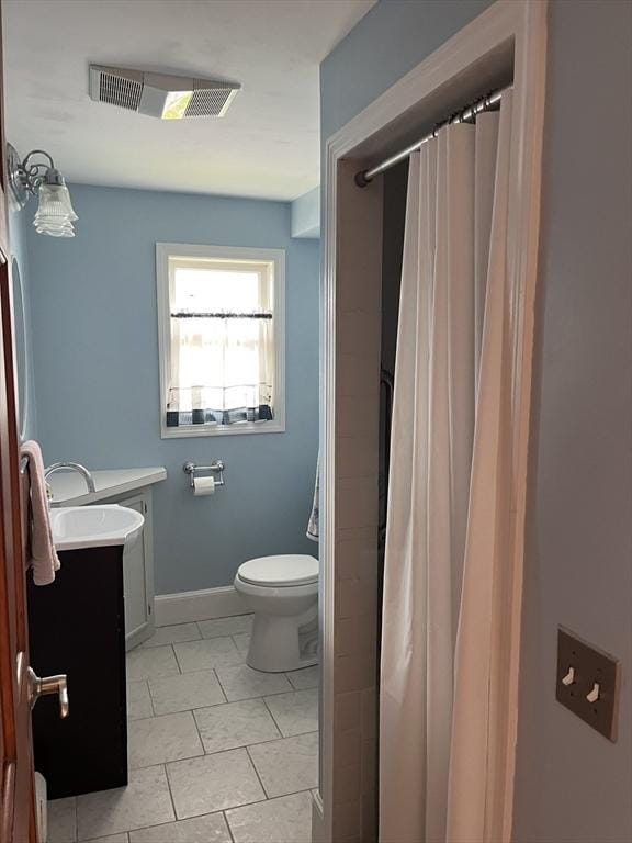 60 Academy Dr, Bourne, MA 02532 - bathroom featuring toilet, vanity, and a shower with shower curtain