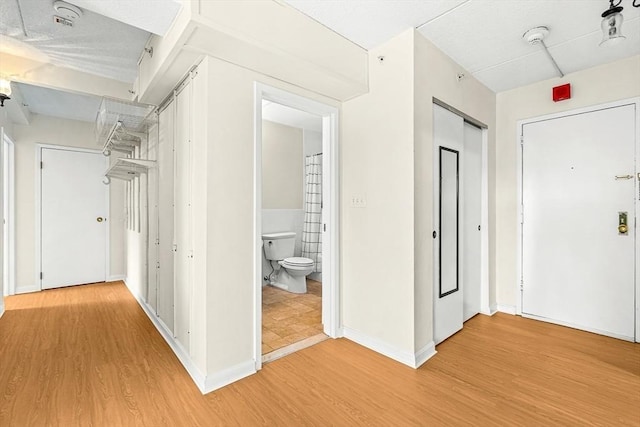 32 Whites Ave Unit F6605, Watertown, MA 02472 - hallway with light wood-style flooring