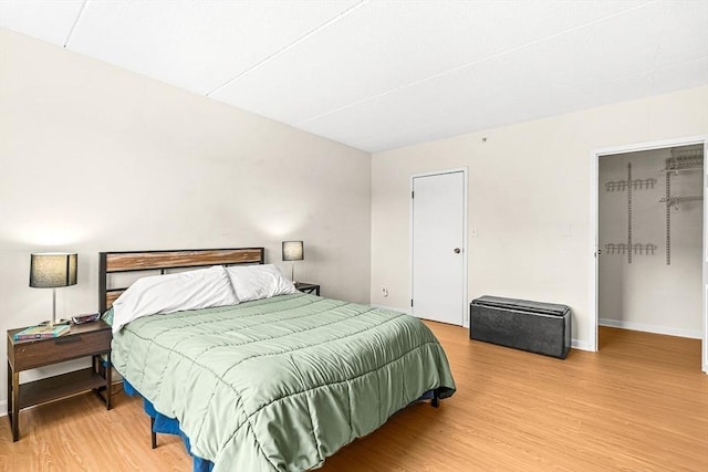 32 Whites Ave Unit F6605, Watertown, MA 02472 - bedroom with wood finished floors and a closet