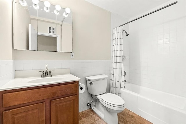 32 Whites Ave Unit F6605, Watertown, MA 02472 - full bathroom featuring vanity, tile walls, shower / bath combination with curtain, and a wainscoted wall