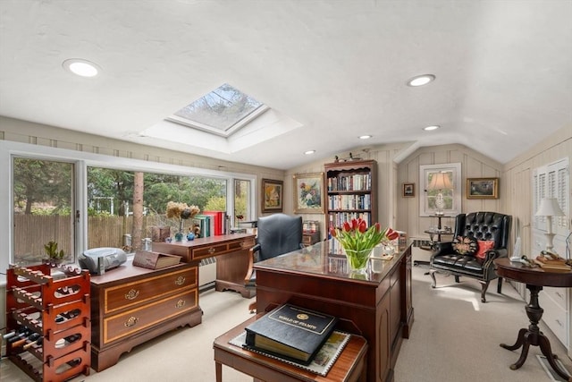 office area with lofted ceiling with skylight, recessed lighting, and light carpet