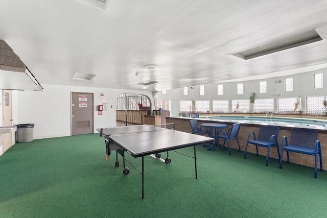 recreation room with carpet floors