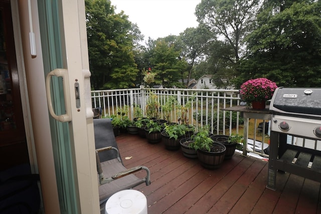 wooden terrace with grilling area