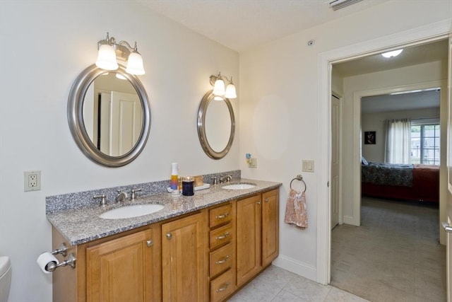 717 Northampton St Unit 41, Holyoke, MA 01040 - ensuite bathroom featuring double vanity and tile patterned flooring