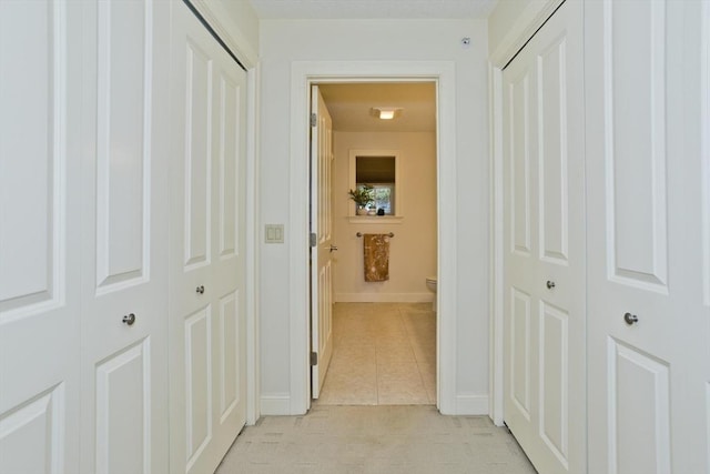 717 Northampton St Unit 41, Holyoke, MA 01040 - corridor featuring light tile patterned floors and baseboards