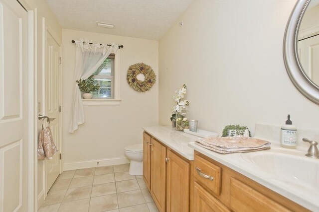 717 Northampton St Unit 41, Holyoke, MA 01040 - bathroom featuring vanity, tile patterned floors, and a textured ceiling