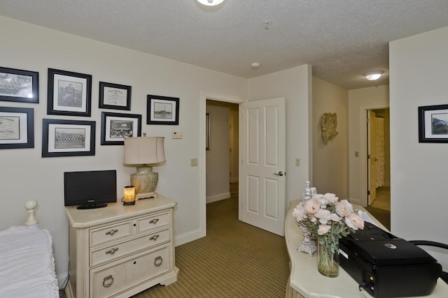 717 Northampton St Unit 41, Holyoke, MA 01040 - carpeted home office featuring baseboards and a textured ceiling