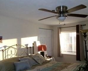 bedroom featuring ceiling fan